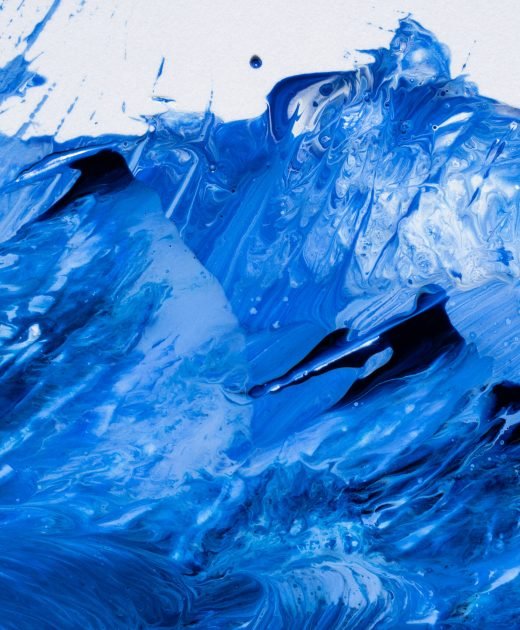 Abstract Beautiful abstraction of liquid paints in slow blending flow mixing together gently